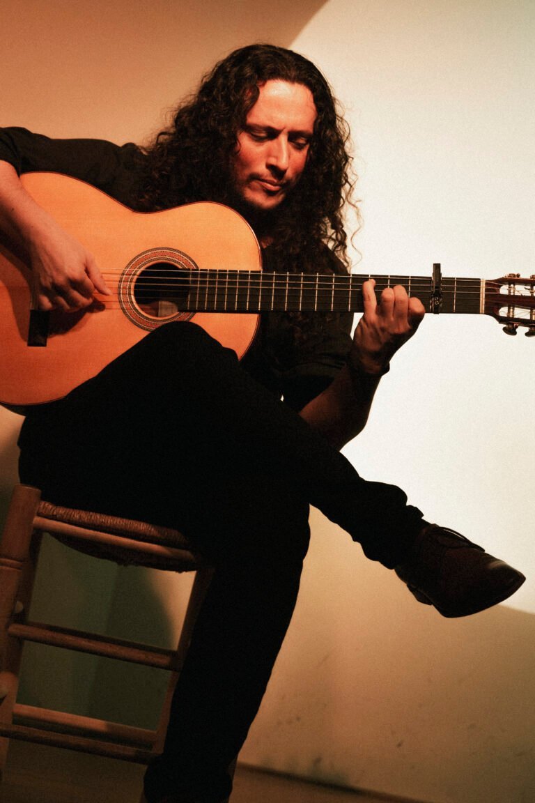 Alejandro Pais Iriart playing flamenco guitar