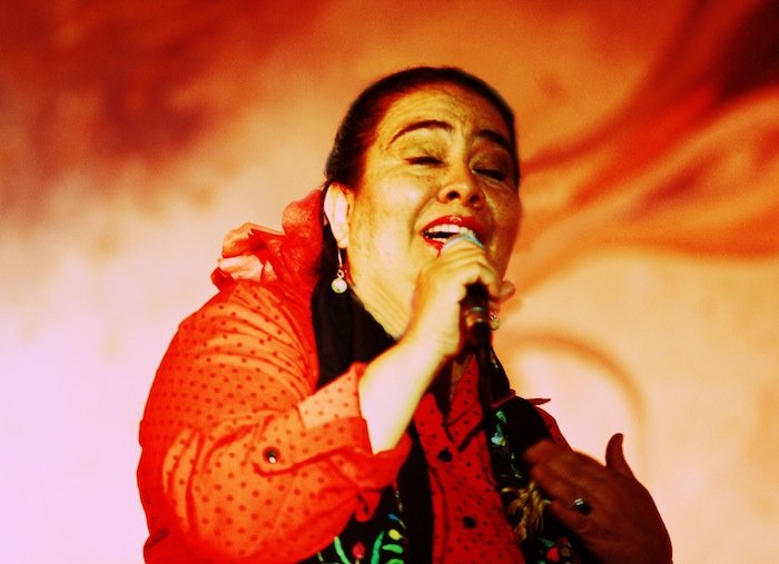 Rosalinda “Chayito” Champion singing flamenco; photograph by Nicole Marie Moore