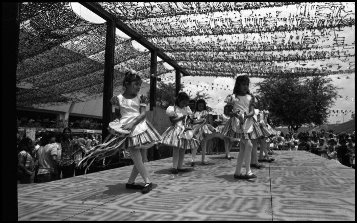 Young dancers with tambourines at the Texas Folklife Festival 1975